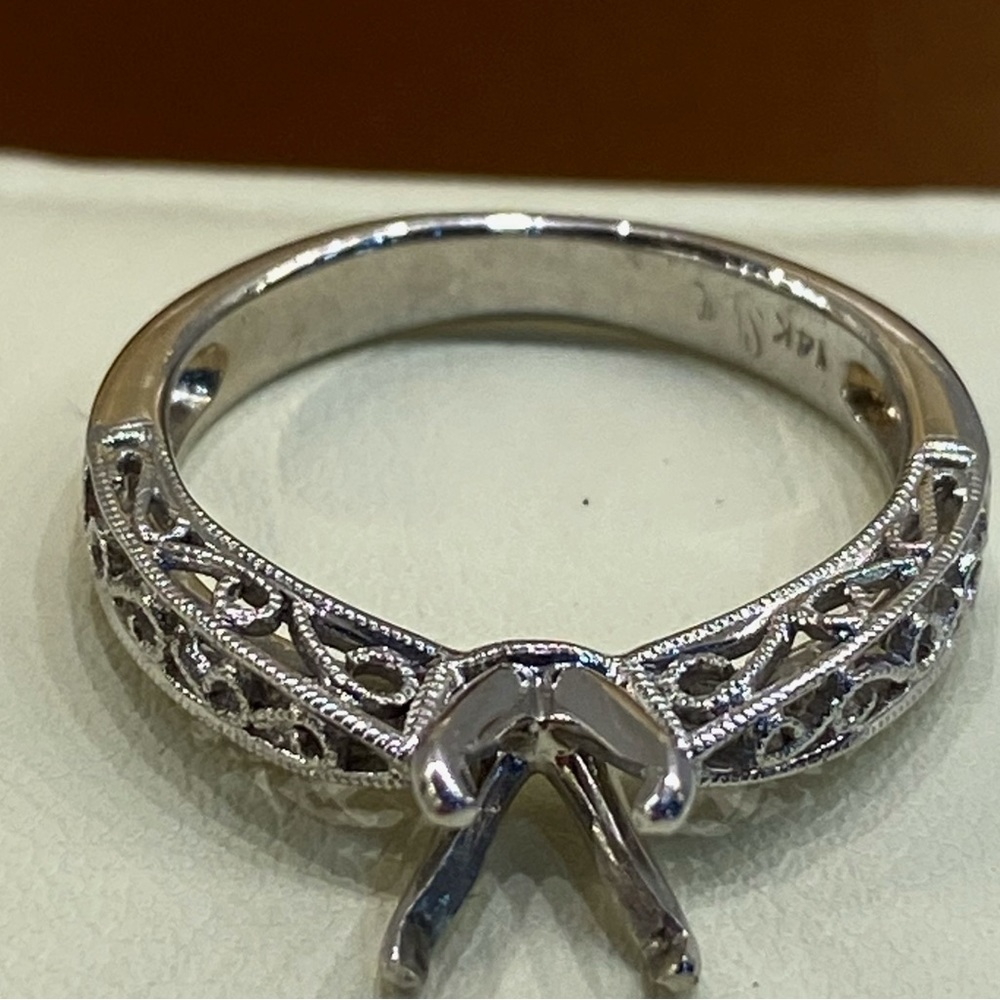 14K white gold setting. All it needs is your stone.